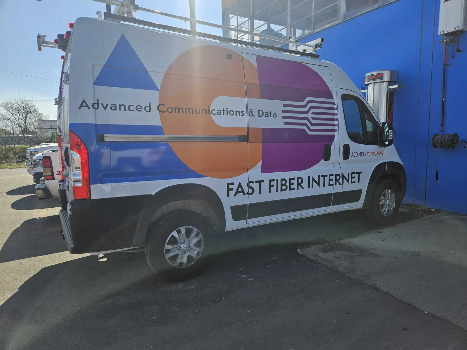 ACD fiber field-service vehicle outside the Lansing facility
